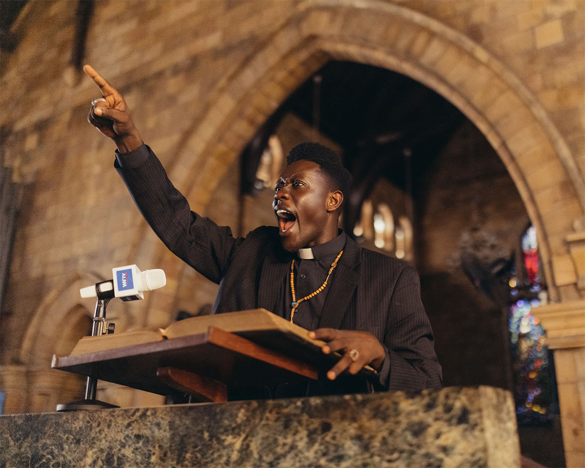 Photo of a preacher in a church in Ghana